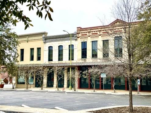 A building with many windows
Description automatically generated